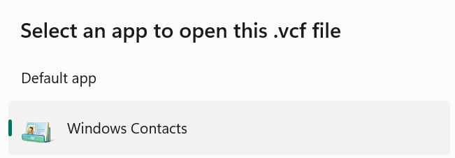 "A dialog in Windows 11 that says: Select an app to open this .vcf file. As default app it offers Windows Contacts"